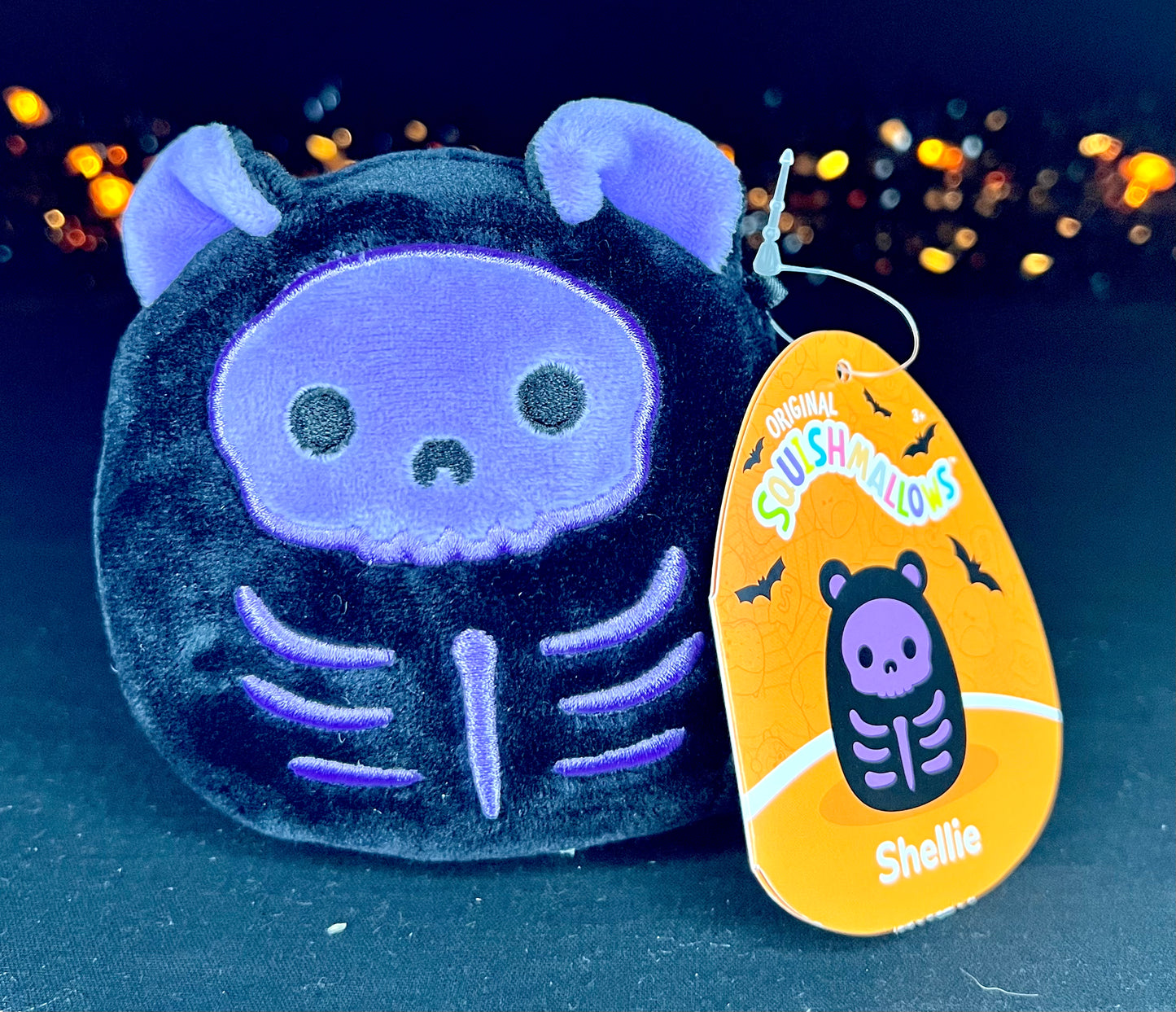 Squishmallow 4” Shellie the Skeleton Bear.