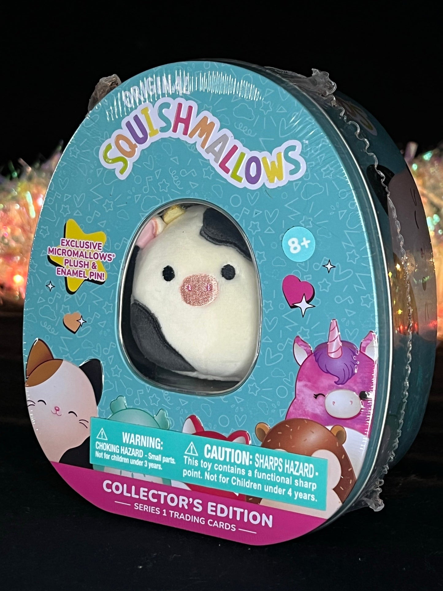 Squishmallow Collector’s Tin: Connor the Cow Sweet Magnolia Charms